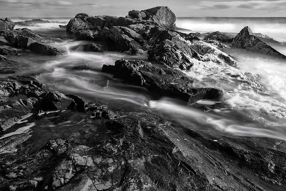 Waves rushing through rocks