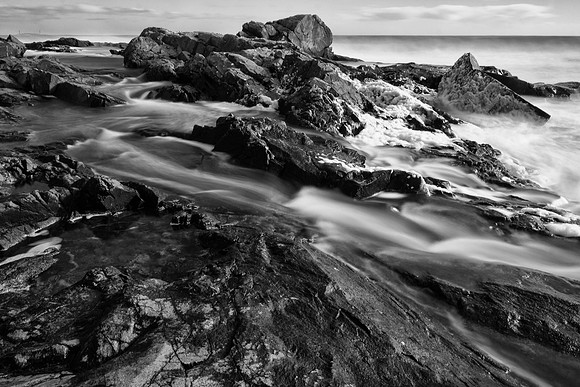 Waves rushing through rocks