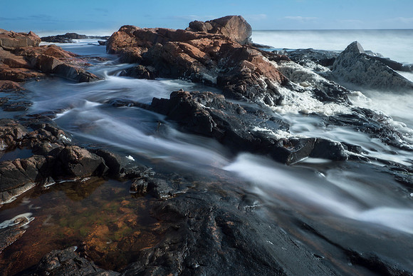 Waves rushing through rocks