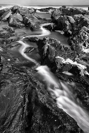Waves rushing through rocks