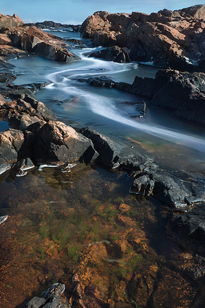 Waves rushing through rocks